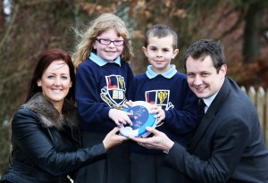 Leeanne McCullough, HR Manager, Heartsine Technologies Northern Ireland, Mossley Primary School pupils Kaye Ferguson (P4) and Adam Campbell (P4) and Darren McVicker, Managing Consultant, VickerStock specialist technical engineering recruitment agency.